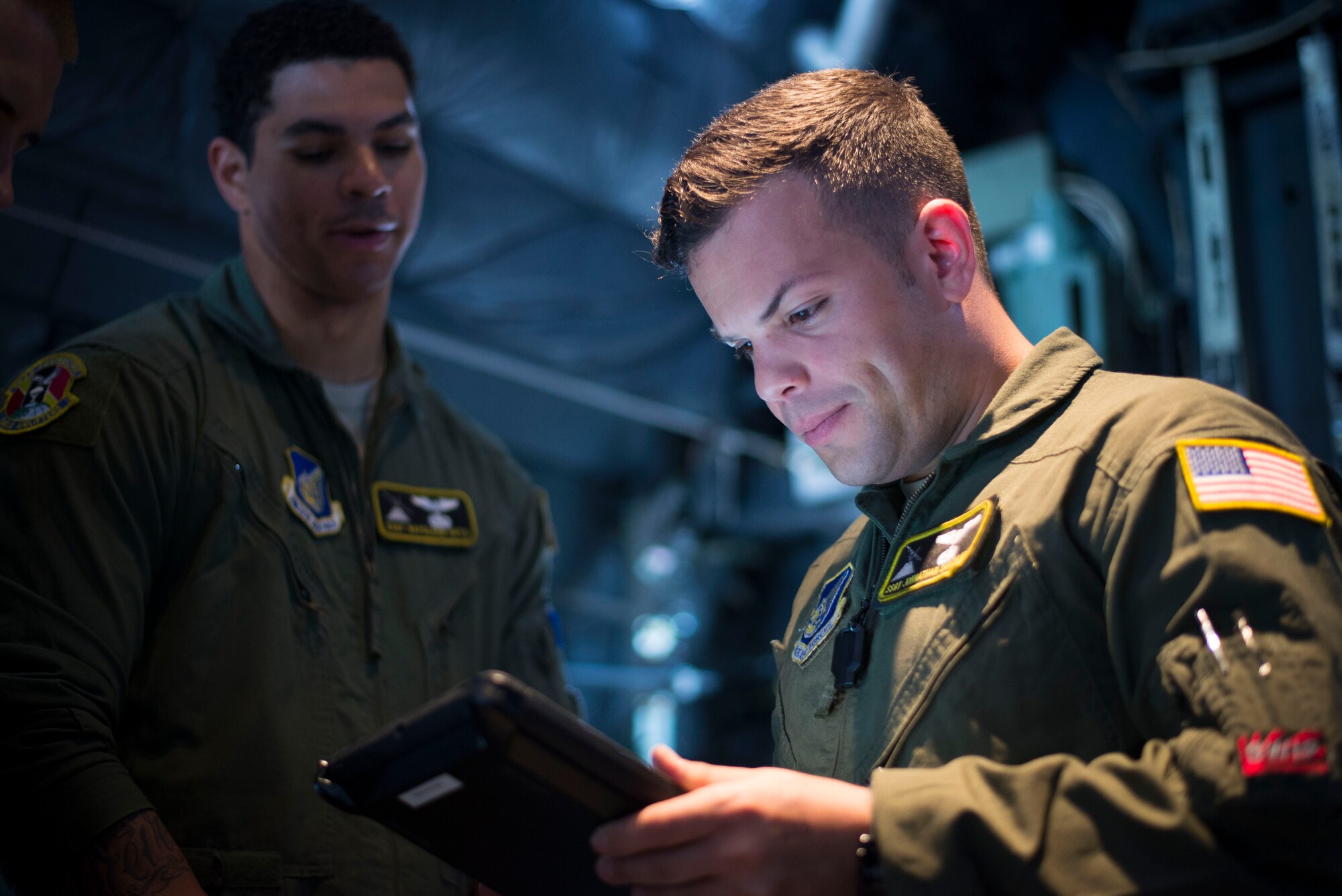 Staff Sgt. Johnathan Santiago, 36th Airlift Squadron loadmaster, performs pre-flight checks on a C-130 Hercules prior to an off-site training sortie Aug. 5, 2014, Joint Base Elmendorf-Richardson, Alaska. The training was designed to give aircrew members the necessary skills to operate during a contingency. (U.S. Air Force photo by Staff Sgt. Chad C. Strohmeyer/Released)