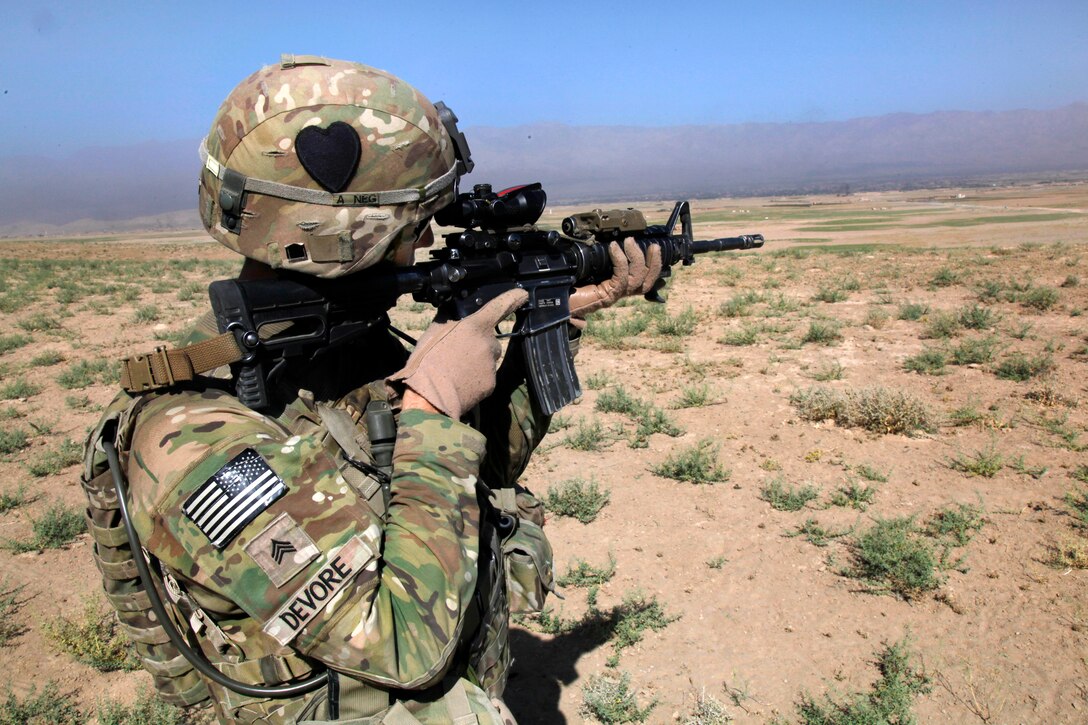 U.S. Army Sgt. James Devore provides security during a patrol in Afghanistan's Parwan province, Aug. 11, 2014. Devore is assigned to the 101st Airborne Division's 1st Battalion, 75th Cavalry Regiment, 2nd Brigade Combat Team.