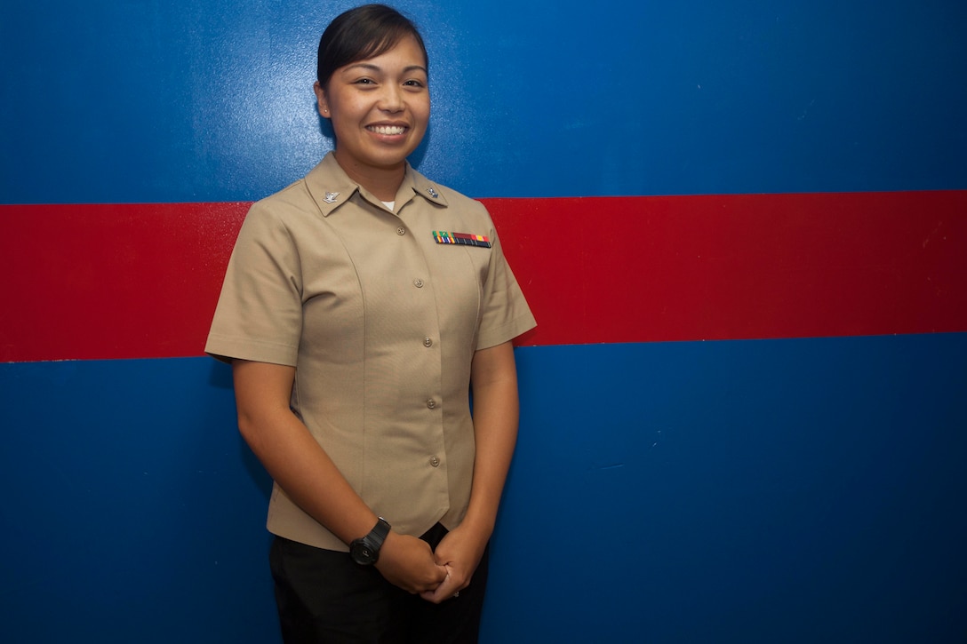 Petty Officer 3rd Class Traciemarie D. San Juan, shown here, was recently was presented with the Navy / Marine Corps Achievement Medal for her actions in stabilizing a Marine World War II veteran after he suffered a cardiac arrest while attending the 69th Reunion of Honor ceremony at Iwo To (the island formerly known as Iwo Jima). The ceremony, held Mar. 19, 2014, was a tribute to the veterans who fought at the Battle of Iwo Jima. San Juan assisted in the stabilizing and transporting of the veteran from Iwo To to the Guam Naval Hospital onboard a C-130 Super Hercules for further medical evaluation. San Juan is a corpsman with Health Service Support Platoon, Combat Logistics Battion-31, 31st Marine Expeditionary Unit, and is a native of Napa, California. 