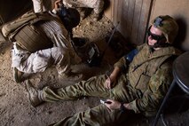 MARINE CORPS TRAINING AREA BELLOWS, Hawaii – A U.S. Navy corpsman diagnoses an injured Australian Defence Force soldier who simulated wounds during a raid on a military operations in urban terrain facility at Marine Corps Training Area Bellows, July 12, during Rim of the Pacific (RIMPAC) Exercise 2014. The corpsman used the Tactical Tele-Medicine (TTM) machine to assess the soldier’s condition and relayed information back to the command operations center. The TTM is part of the Marine Corps Advanced Warfighting Experiment, a culmination of progressive experiments designed to test potential future technologies, solutions and concepts to future Marine Air Ground Task Force challenges. (U.S. Marine Corps photo by Cpl. Matthew J. Bragg)