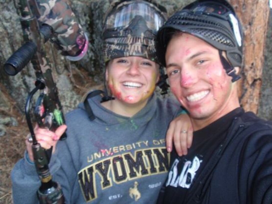 Sergeant Andrea M. Robb, the Theater Provided Equipment clerk with Marine Expeditionary Brigade - Afghanistan, poses for a picture with her husband, Seth Robb. The two first met in middle school, grew up together as best friends, and married during 2010.