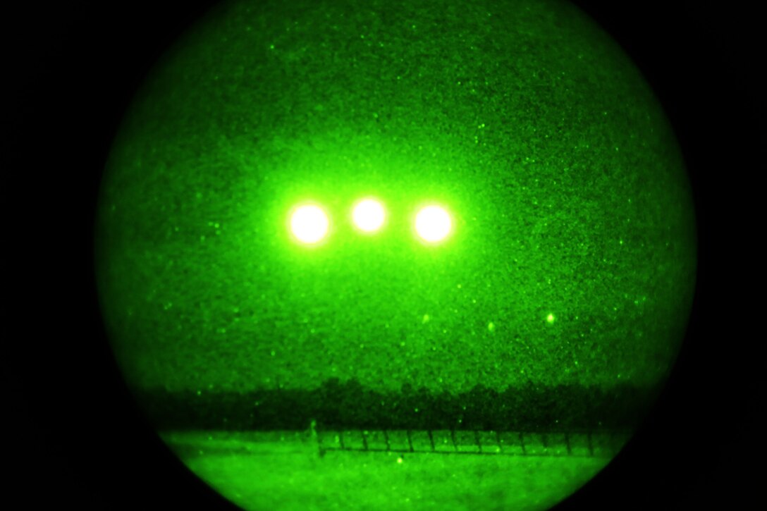 A RQ-7B Shadow unmanned aerial vehicle approaches for landing during night training at Avon Park Air Force Range, Fla., Aug. 4, 2014. Marine Unmanned Aerial Vehicle Squadron 2 conducted a 10-day field exercise to increase the efficiency of the unmanned aerial system commanders, operators and maintainers of the squadron.