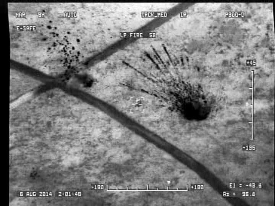 The monitor feed of an unmanned aerial vehicle commander shows the impact of a Hell Fire missile during training at Avon Park Air Force Range, Fla., Aug. 4, 2014. Marine Unmanned Aerial Vehicle Squadron 2 integrated with Marine Light Attack Helicopter Squadron 167 to conduct the live fire training during a 10-day field exercise to increase VMU-2’s ability to operate in a deployed environment.