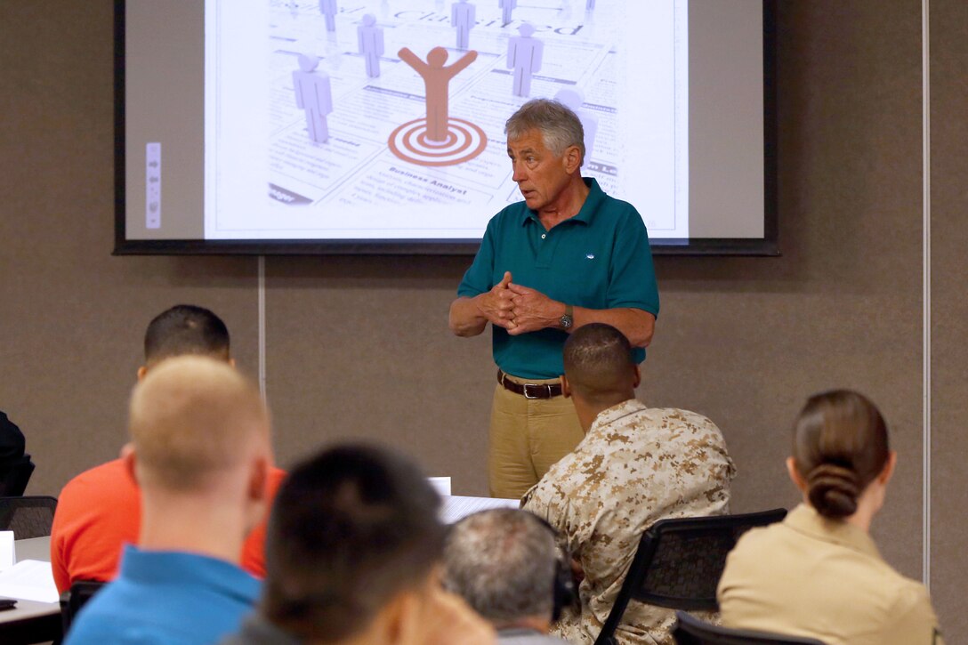 The Secretary of Defense, Chuck Hagel, visits Pendleton as one of the stops during a routine military installations tour Aug. 12.  

Transition is a high priority for the Department of Defense, so while here, Hagel briefly monitored two of the Transition Readiness Program classes before speaking to the attendees.

“Don’t ever underestimate the value of your experience … leadership, common sense and staying cool when there’s a crisis,” said Hagel to the pre-retirement class.  “These are values added that (non-military) people do not have.” 

He thanked the Marines for their service and wished them good luck in their future endeavors before heading to the air station where he conducted a town hall meeting with service members.

