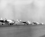 C-119 31 Jan 1961 - 19 Dec 1962; Charlotte Ramp Scene of C-119's (Photo by NCANG Heritage Program)