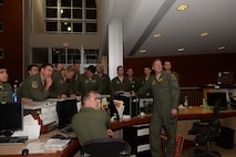 Aircrews from the 2nd Bomb Wing, Barksdale Air Force Base, La., attend a step brief at Ellsworth Air Force Base, S.D., Aug. 11, 2014. Following the brief, a B-52H Stratofortress and seven-person crew from Barksdale’s 96th Bomb Squadron, flew a nonstop, 15.5-hour round-trip intelligence, surveillance and reconnaissance mission from the United States to the U.S. Southern Command area of operations as part of PANAMAX 2014, an annual, U.S. Southern Command-sponsored multinational exercise. PANAMAX 2014 is designed to develop and test participating nations' capabilities to respond and support a wide variety of air, land, sea, space and cyber missions as a unified force. For Air Force Global Strike Command, PANAMAX was an opportunity to familiarize aircrews with the U.S. Southern Command region and train in a unique mission set not normally associated with bomber operations. “The B-52 can be modified with additional equipment that allows it to be an especially valuable ISR platform because of its ability to conduct long-range surveillance flights,” said Lt. Col. Robert Bender, chief of AFGSC's Current Operations Branch. “PANAMAX is an excellent opportunity for our aircrews to exercise these capabilities in an operational training environment.” (U.S. Air Force photo by Airman 1st Class Rebecca Imwalle/ Released)