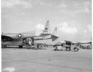 C-119 31 Jan 1961 - 19 Dec 1962; Scene of C-119's on Charlotte Ramp; Note the Red Cross Symbol on the Tails.  At this time, the NCANG was known as the 145th Aeromedical Transport Group; and the flying squadron was known as the 156th Aeromedical Transport Squadron.
(Photo by NCANG Heritage Program)  If you recognize anyone in our photos, please contact the NCANG at NCANG.Heritage@gmail.com