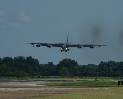 A B-52H Stratofortress returns home to Barksdale Air Force Base, Louisiana, Aug. 12, 2014 following a 15.5-hour sortie from the United States to the U.S. Southern Command area of operations during PANAMAX 2014. An annual U.S. Southern Command-sponsored multinational exercise, PANAMAX focuses on ensuring the defense of the Panama Canal. “The Panama Canal is one of the most strategically and economically crucial pieces of infrastructure in the world,” said Col. Gregory Julian, U.S. Southern Command spokesman. “The 17 partner nations participating in this exercise benefit from the collaborative efforts to ensure the safety and security of the Panama Canal and this exercise is designed to test their responsiveness, foster cooperation, and increase interoperability among them.” The B-52 sortie, which originated at Ellsworth Air Force Base, South Dakota, was the only live military asset used in the primarily simulated exercise. For Air Force Global Strike Command, PANAMAX provided an opportunity to familiarize aircrews with the region and train in long-range intelligence, surveillance and reconnaissance operations – a unique mission set not normally associated with bomber operations. (U.S. Air Force photo/Senior Airman Benjamin Gonsier)