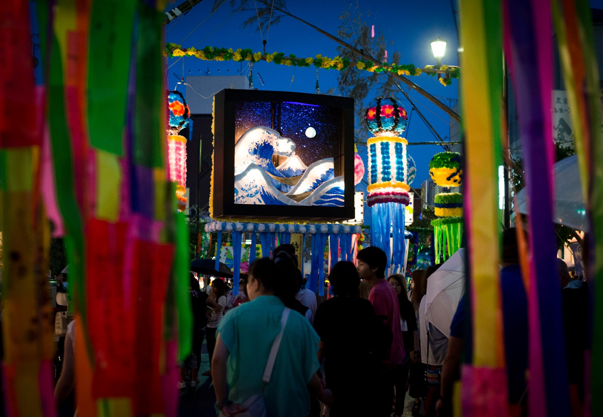 Festival decorations hang down during the Fussa Tanabata Festival in Fussa City, Japan, Aug. 8, 2013. This year marked the 64th annual Tanabata Festival in Fussa, and attracted people from all over the surrounding area. (U.S. Air Force photo by Airman 1st Class Meagan Schutter/Released)