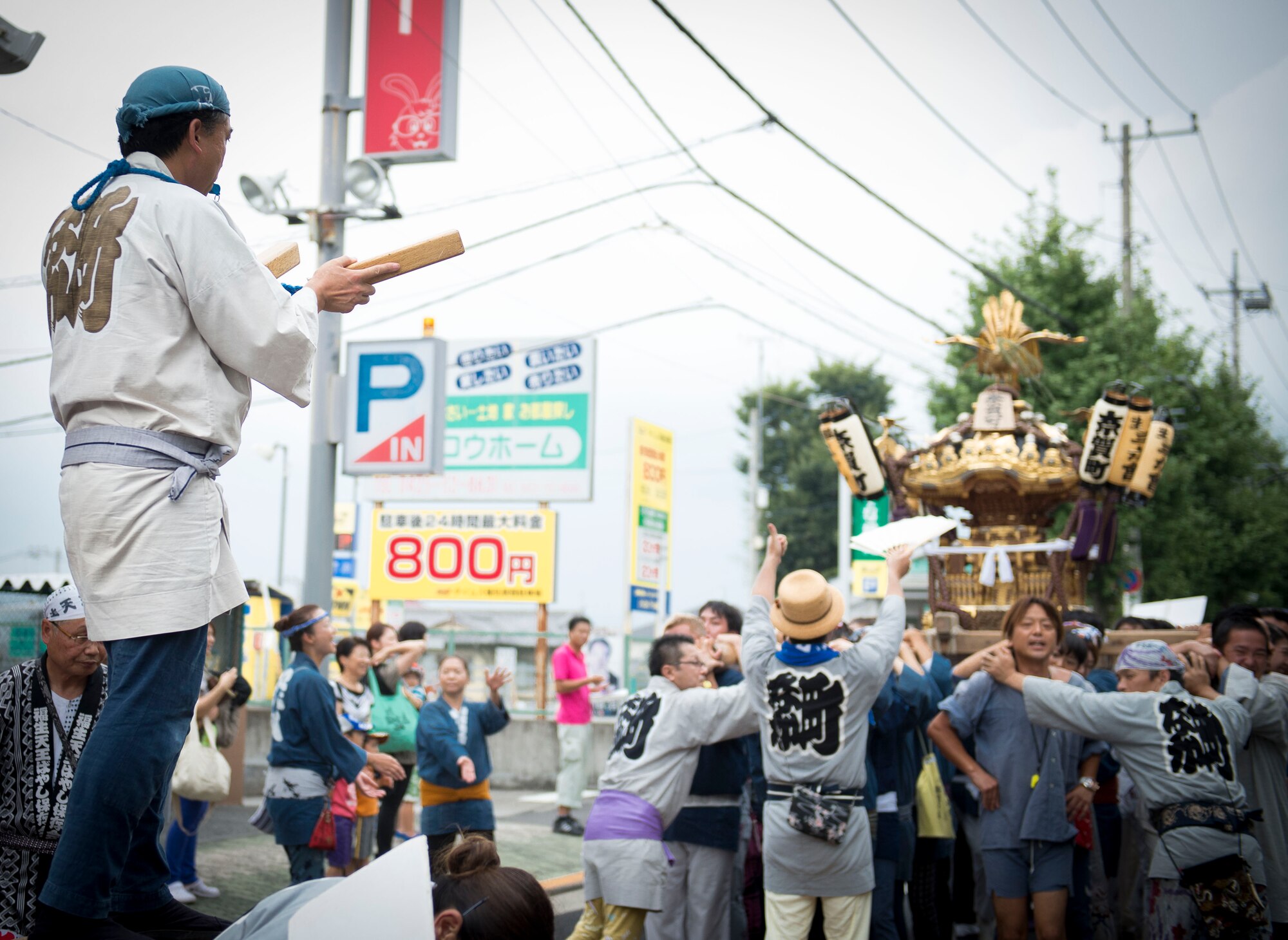 Local residents prepare to set down their mikoshi shrine during the Fussa Tanabata Festival in Fussa City, Japan, Aug. 8, 2013. Each year, members of Yokota join the festival to participate in the Japanese tradition and foster relationships with the local community. (U.S. Air Force photo by Airman 1st Class Meagan Schutter/Released)