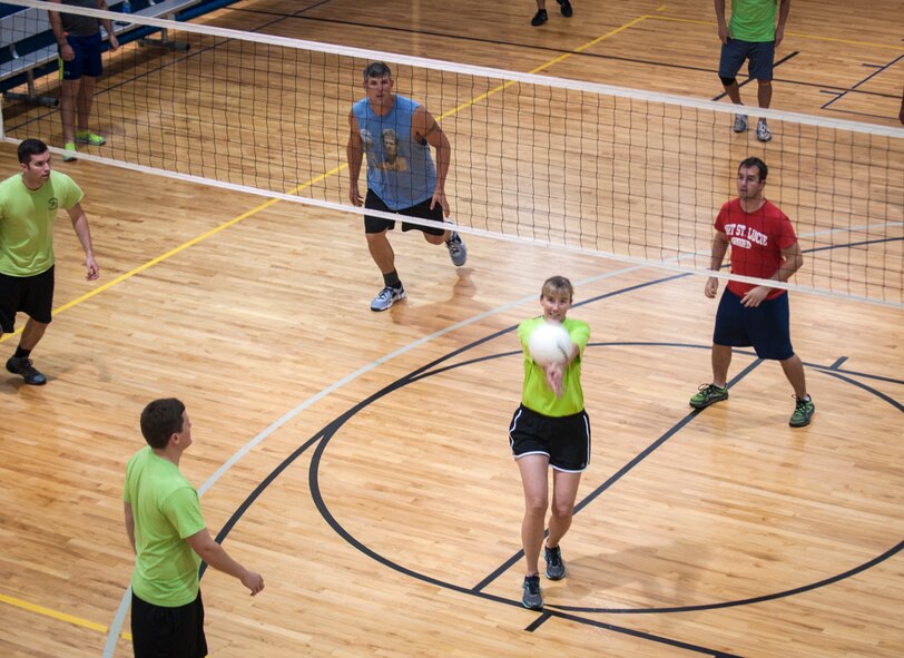 Team Money sets up a play during a volleyball tournament at Moody Air Force Base, Ga., Aug. 8, 2014. Team Money, members from the 23d Comptroller Squadron, earned second place in the tournament. (U.S. Air Force photo by Senior Airman Jarrod Grammel/Released)
