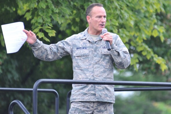 YOUNGSTOWN AIR RESERVE STATION, Ohio – Air Force Reserve Col. Darryl Markowski, 910th Airlift Wing vice commander, addresses a crowd of Citizen Airmen assigned to the Air Force Reserve’s 910th Airlift Wing and their families during the wing’s recent Family Day held here, August 3, 2014. Family day is an installation open house held for 910th Servicemembers and their families, designed to let Reserve families strengthen bonds and experience the home station of their Reservist loved one. U.S. Air Force photo by Tech. Sgt. James Brock.