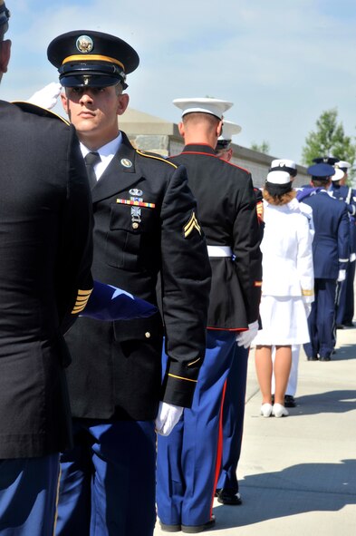 Honor Guard members from each branch of U.S. military service paid respects to 44 veterans laid to rest during the 4th Annual Missing in America Interment Service at Medical Lake, Washington, Aug. 8, 2014. The Missing in America Project is a nation-wide effort to locate, identify and inter the unclaimed remains of forgotten veterans, providing honor and respects to those who have served this country by giving them a final resting place. (U.S. Air Force photo/Senior Airman Mary O'Dell)