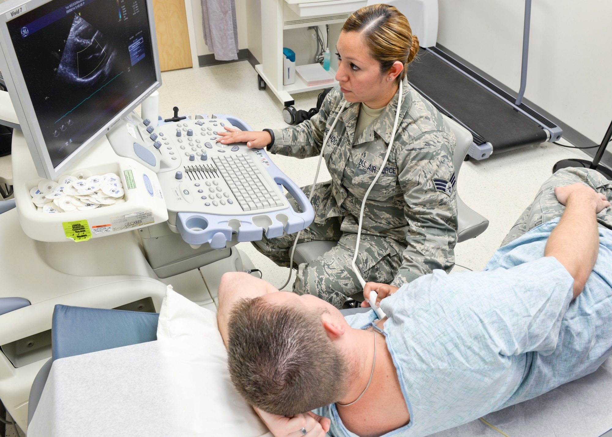 U.S. Air Force Senior Airman Paola Maldonado, 633rd Medical Operations Squadron cardiopulmonary laboratory technician, uses an echocardiogram on a simulated patient during a training session at Langley Air Force Base, Va., Aug. 6, 2014. The ultrasound measures chamber sizes and blood-flow of the heart to diagnose potential health issues. Maldonado hails from San Antonio. (U.S. Air Force photo by Senior Airman Connor Estes/Released)