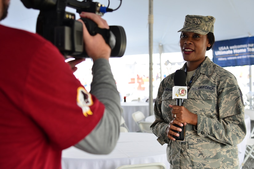 Service members join the Commanders for USAA Salute to Service