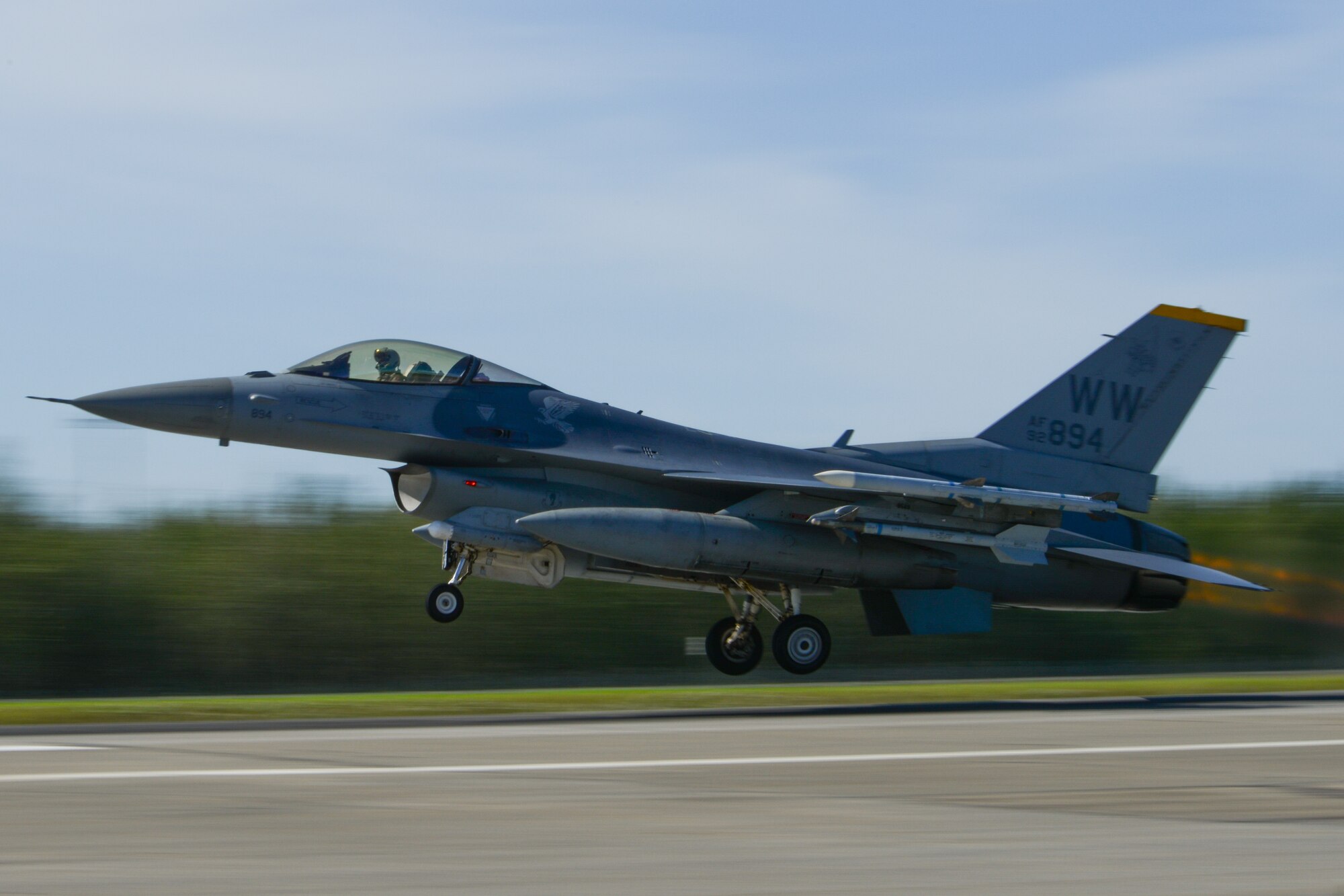 A U.S. Air Force F-16 Fighting Falcon assigned to the 14th Fighter Squadron, Misawa Air Base, Japan, launches during RED FLAG-Alaska 14-3 Aug. 8, 2014, Eielson Air Force Base, Alaska. The F-16 is a compact, highly maneuverable fighter aircraft, vastly proven in air-to-air combat and air-to-surface attack. (U.S. Air Force photo by Tech. Sgt. Joseph Swafford Jr./Released)
