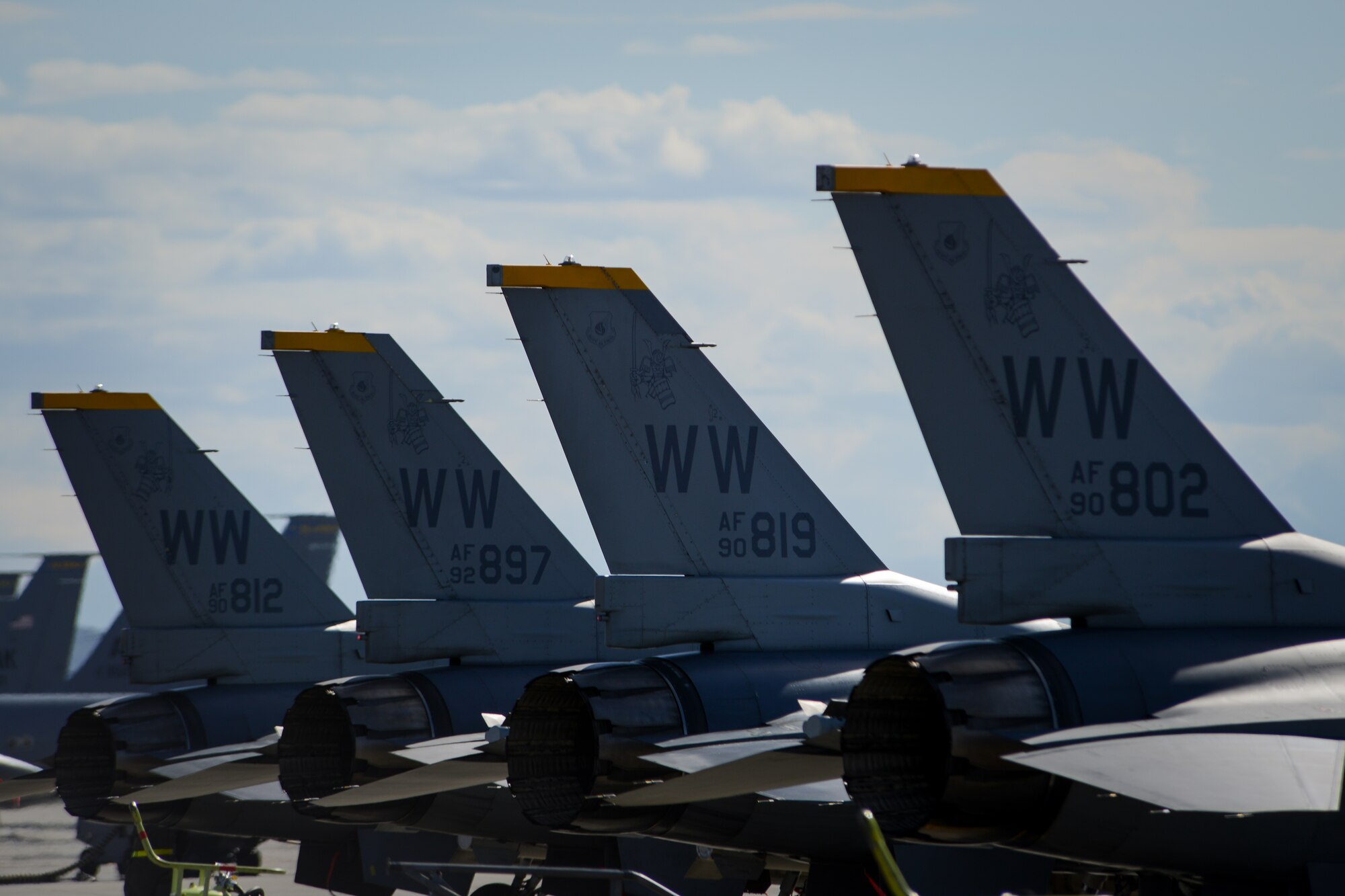 U.S. Air Force F-16 Fighting Falcons assigned to the 14th Fighter Squadron, Misawa Air Base, Japan, prepare for a sortie during RED FLAG-Alaska 14-3 Aug. 8, 2014, Eielson Air Force Base, Alaska. The F-16 is a compact, highly maneuverable fighter aircraft, vastly proven in air-to-air combat and air-to-surface attack. (U.S. Air Force photo by Tech. Sgt. Joseph Swafford Jr./Released)