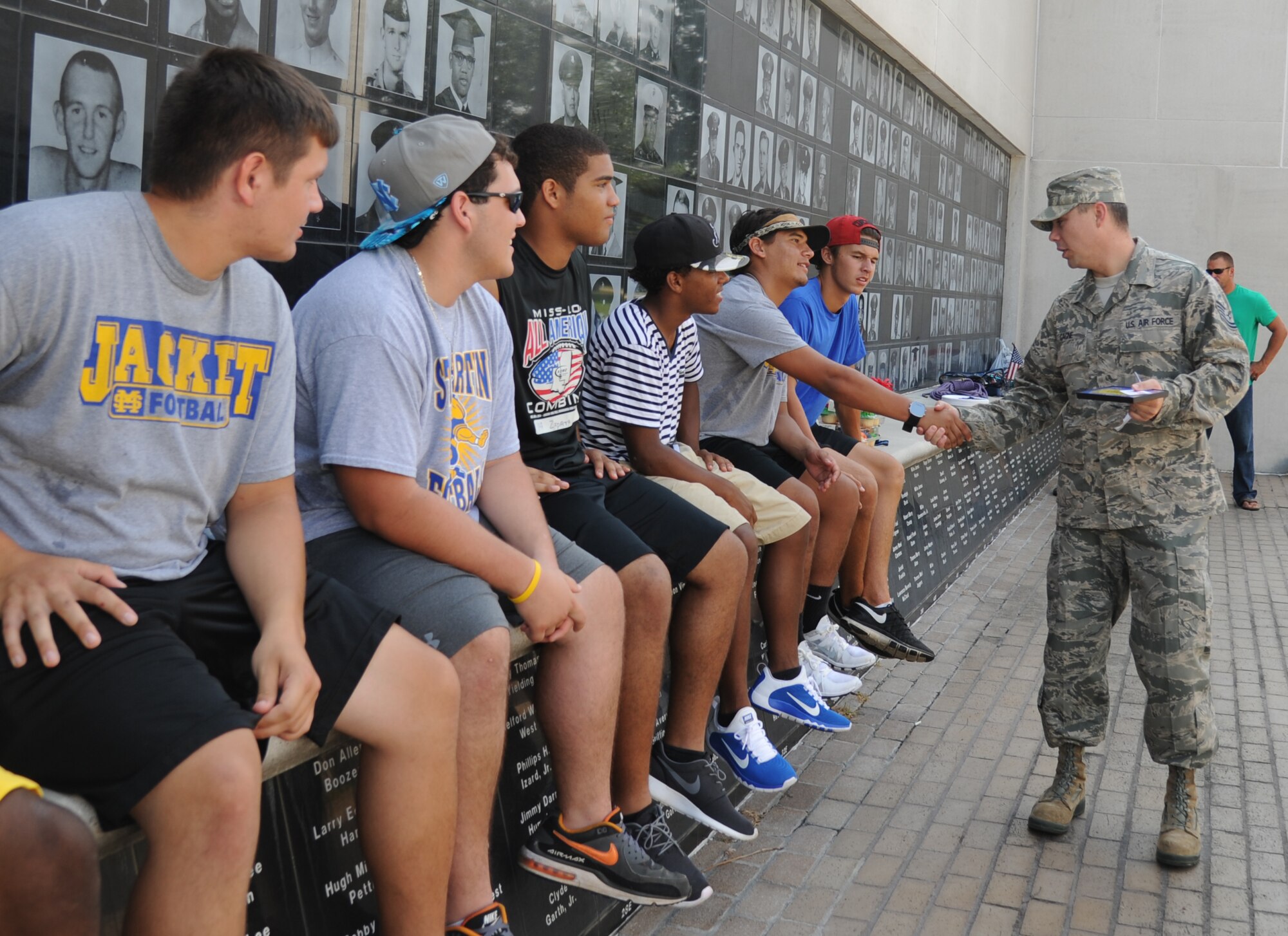 Tech. Sgt. Nick Gagne, 338th Training Squadron, talks to St. Martin High School senior football players about the importance of a positive attitude in all situations during a leadership seminar Aug. 9, 2014, at the Mississippi Vietnam Veterans Memorial in Ocean Springs, Miss. The seminar was a collaboration of the St. Martin Gridiron Club and Keesler personnel, who also briefed the seniors on good attitudes, values, beliefs and teamwork.  (Courtesy photo by Kemberly Groue)