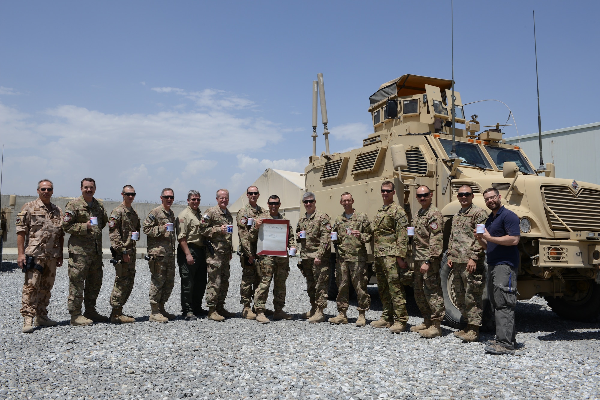 A group of U.S. joint and coalition deployed servicemembers who are among the "Gavin Fan Club" at Forward Operating Base Oqab in Kabul, Afghanistan. (U.S. Air Force photo/Senior Master Sgt. Mike Hammond) 
