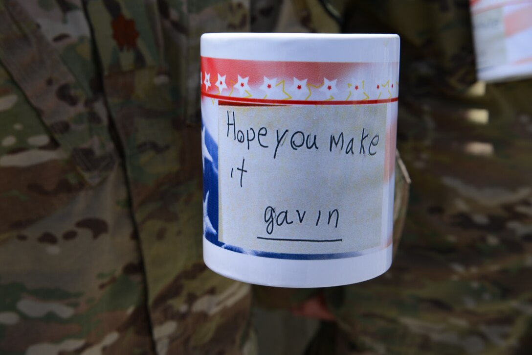 A coffee cup servicemembers had created based on a four-word note a boy named Gavin sent on a holiday card - "Hope you make it." The boy's note continues to amuse and inspire many deployed members at Forward Operating Base Oqab, Kabul, Afghanistan. (U.S. Air Force photo/Senior Master Sgt. Mike Hammond) 