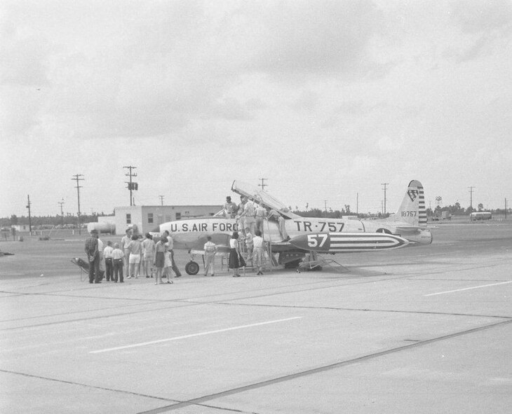 In this historic photo, a T-33 Shooting Star sits on display at Pinecastle Air Force Base, Fla. The paint scheme of a T-33 at Moody Air Force Base, Ga., was based off of this original design. The T-33 was used at Moody from 1957-1960 and has ties to the 76th Fighter Squadron.(courtesy photo)
