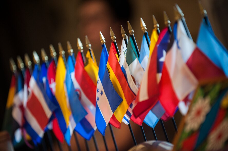 South American flags stand during Diversity Day on Minot Air Force Base, N.D., Aug. 7, 2014. The annual event featured original South American food and items. (U.S. Air Force photo/Airman 1st Class Apryl Hall)