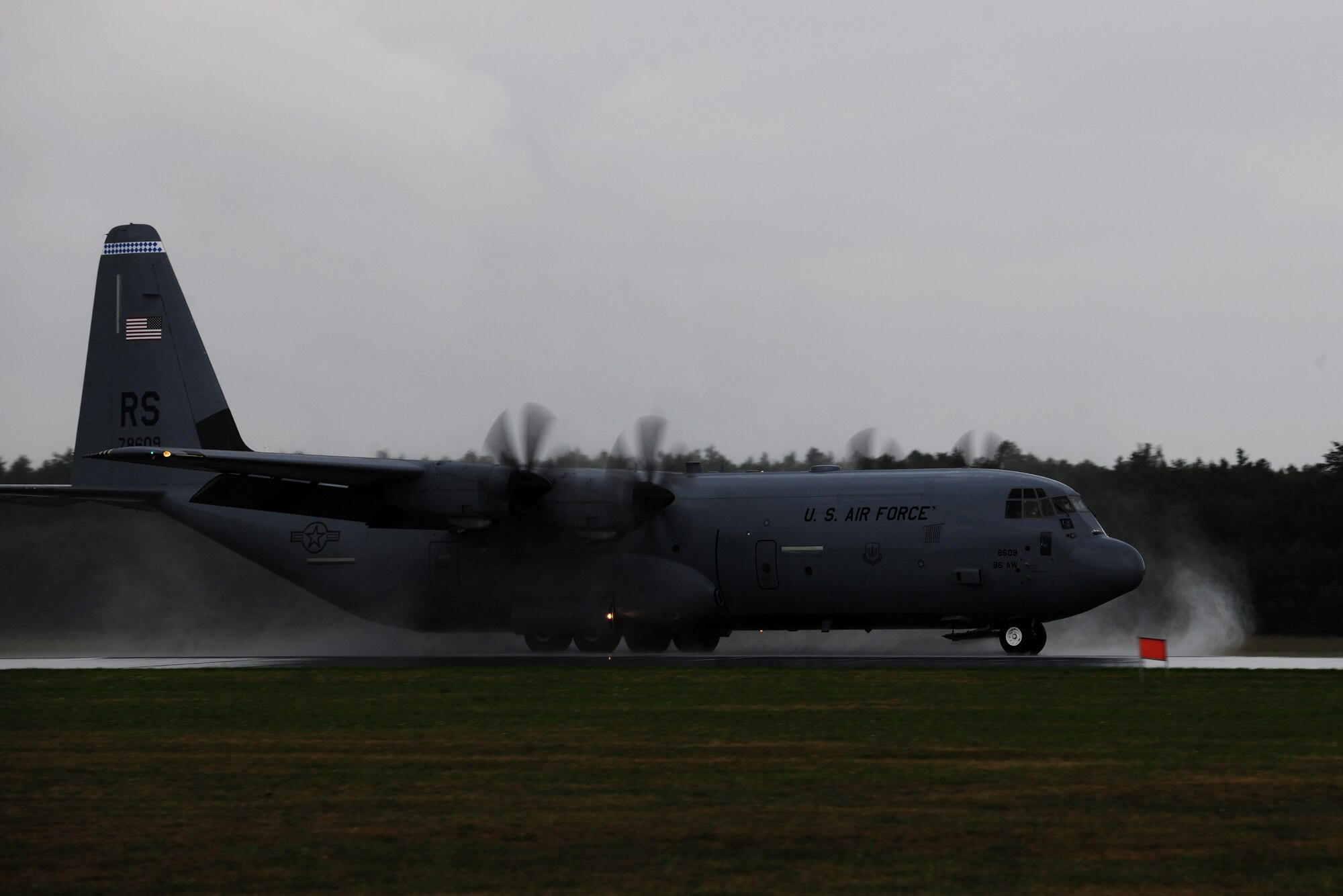 A C-130J Super Hercules lands on the flightline during a flying training deployment at Powidz Air Base, Poland, Aug. 11, 2014. This deployment, as part of Operation Atlantic Resolve, allowed Airmen to work side-by-side with NATO partners to bolster the United States’ commitment to a peaceful and stable Europe. (U.S. Air Force photo by Staff Sgt. Jarad A. Denton/Released)