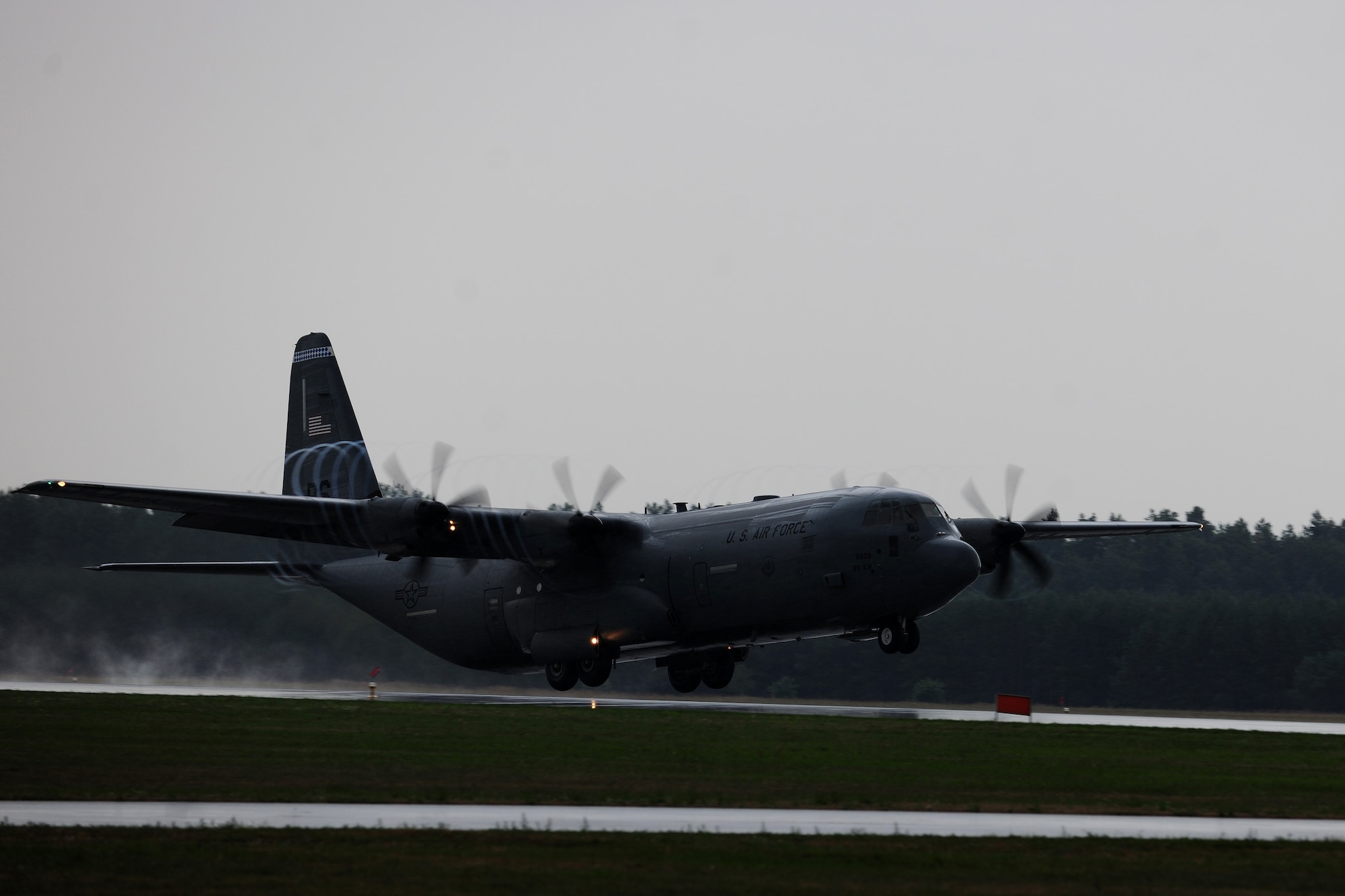 A C-130J Super Hercules takes off after performing a “touch-and-go” at Powidz Air Base, Poland, Aug. 11, 2014. Airmen from Ramstein Air Base, Germany, deployed to Poland as part of a bilateral training mission, in support of Operation Atlantic Resolve, designed to promote regional stability and security. (U.S. Air Force photo by Staff Sgt. Jarad A. Denton/Released)