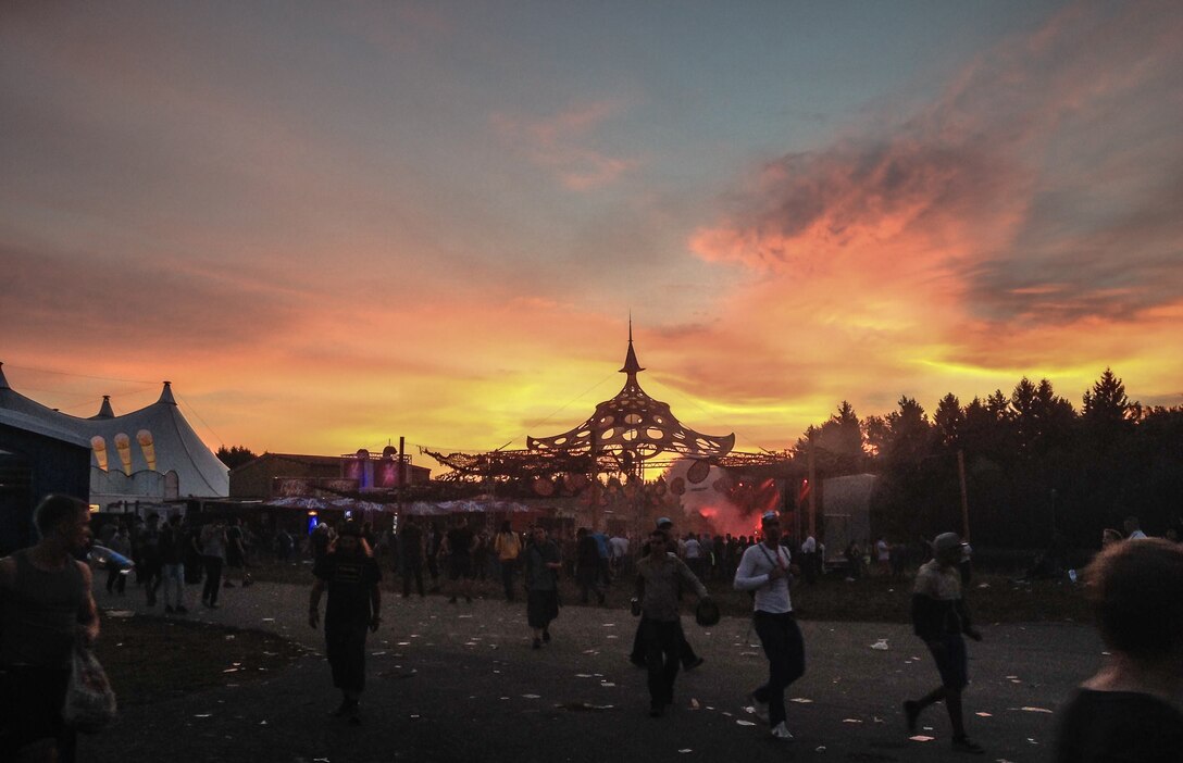 Festival attendees leave the Nature One festival grounds at 6 a.m., Aug. 2, 2014, inside the former Pydna Missile Base, Germany. Day one of the German dance music festival saw major international entertainers drawing in an expected 72,000 attendees. (U.S. Air Force photo/Airman 1st Class Jordan Castelan)