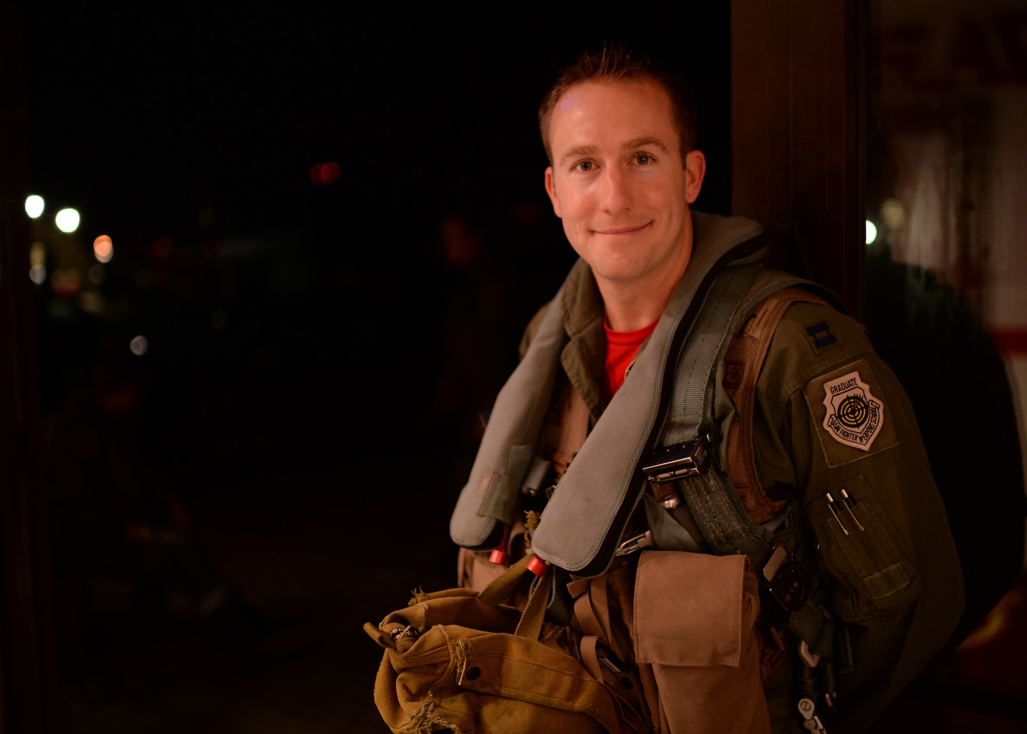 U.S. Air Force Capt. Taylor Blevins, a U.S. Air Force F-16 Fighting Falcon fighter aircraft pilot from the 480th Fighter Squadron at Spangdahlem Air Base, Germany, poses for a photograph Aug. 8, 2014, prior to departing for a bilateral training event between the U.S. and Hellenic air forces in Souda Bay, Greece, Aug. 11-23. This event not only satisfies training requirements for the squadron, but it aims to expand strategic and operational ties with the Hellenic air force. (U.S. Air Force photo by Staff Sgt. Daryl Knee/Released)