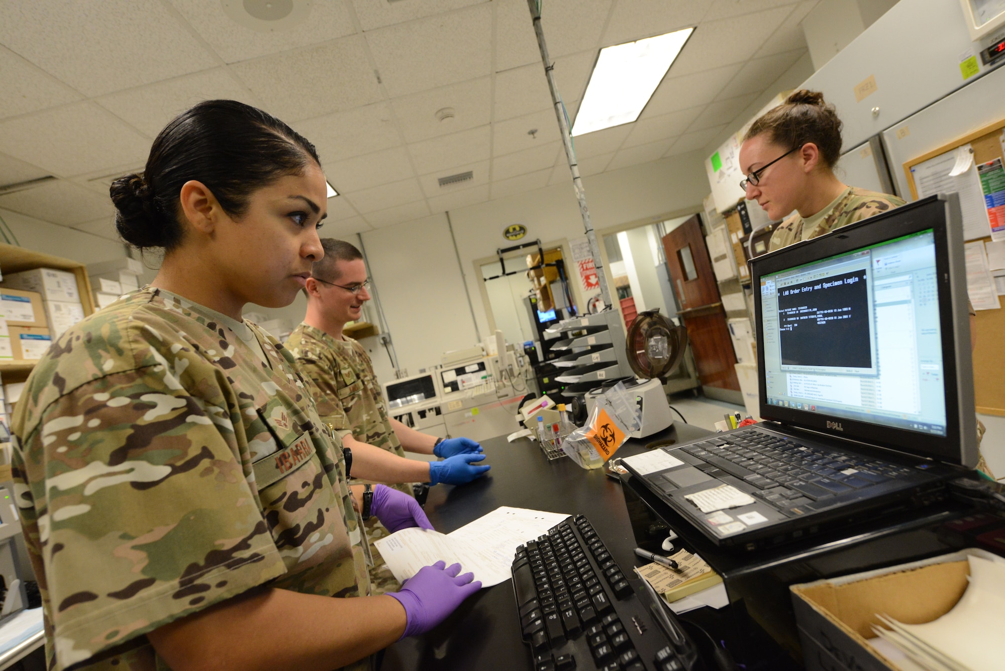 U.S. Air Force Senior Airman Kandie Ibarra, a native of Blackfoot, Idaho and a lab technician assigned to the 455th Medical Support Squadron, verifies a patient’s blood type in the data system while working in the blood bank of the Craig Joint Theater Hospital, Bagram Airfield, Afghanistan June 23, 2014. Ibarra is deployed from Keesler Air Force Base, Miss. (U.S. Air Force photo by Master Sgt. Cohen A. Young/Released)