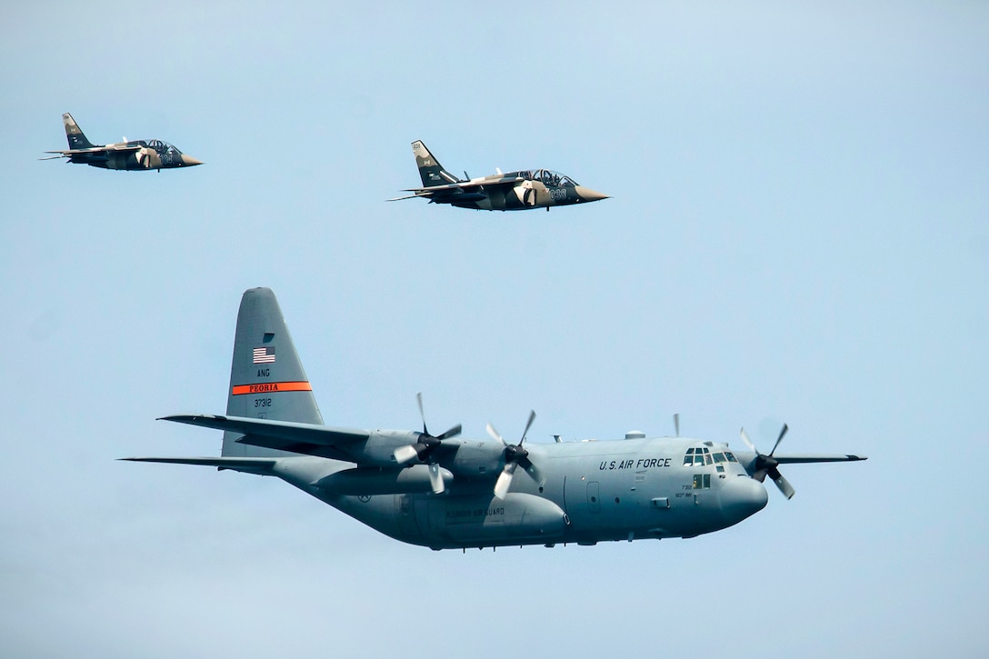 Canadian Alpha jets escort a C-130 Hercules aircraft during Operation Northern Strike near Rogers City, Mich., Aug. 7, 2014.