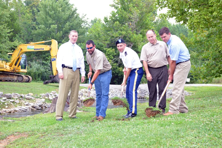 U.S. Army Corps of Engineers Nashville District, Kentucky Department of Fish and Wildlife Resources, U.S. Fish and Wildlife Service, state legislators and Russell County officials held a ceremony today marking the groundbreaking for a $1.8 million Wolf Creek Hatchery Wetland and Stream Mitigation Program project below the Wolf Creek National Fish Hatchery.