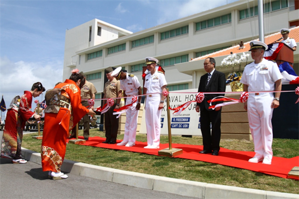 Marines, sailors and distinguished guests cut the ribbon during a ceremony signifying the opening of the U.S. Naval Hospital Okinawa on Camp Foster in 2013. The U.S. Army Engineering and Support Center, Huntsville's Medical Facilities Mandatory Center of Expertise and Standardization played a key role in the design of the new hospital and was recognized with other members of the project delivery team as the 2014 PDT of the Year for Excellence during the 2014 Strategic Leaders Conference awards dinner at Fort Belvoir, Virginia, Aug. 7.