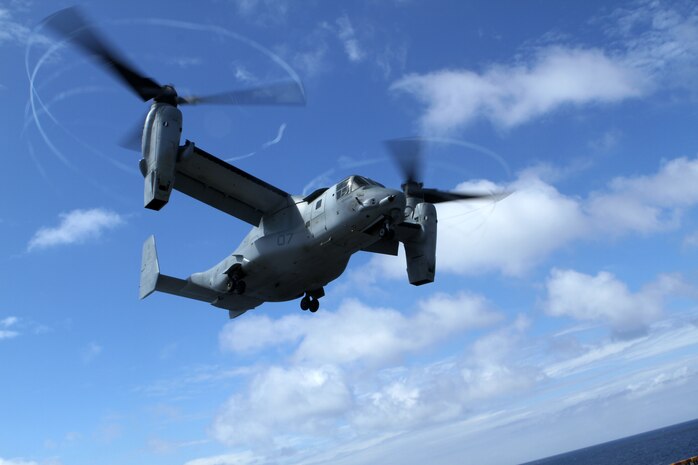 An MV-22B Osprey from Marine Medium Tiltrotor Squadron 365 (Reinforced), 24th Marine Expeditionary Unit, takes off from the USS Iwo Jima off the coast of North Carolina, Aug. 11, 2014. The 24th MEU is taking part in Amphibious Squadron/Marine Expeditionary Unit Integration, or PMINT, the 24th MEU’s second major pre-deployment training exercise. PMINT is designed to bring Marines and Sailors from the 24th MEU and Amphibious Squadron 8 together for the first time aboard the ships of the Iwo Jima Amphibious Ready Group. (U.S. Marine Corps photo by Sgt. Devin Nichols)