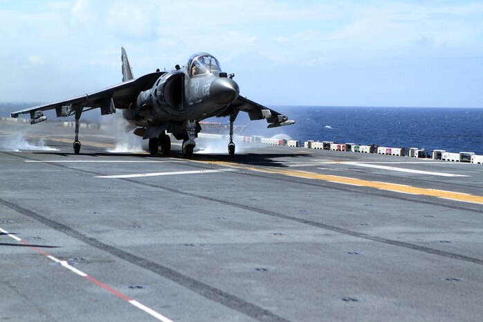 An AV-8B Harrier Jump Jet from Marine Medium Tiltrotor Squadron 365 (Reinforced), 24th Marine Expeditionary Unit, takes off from the USS Iwo Jima off the coast of North Carolina, Aug. 11, 2014. The 24th MEU is taking part in Amphibious Squadron/Marine Expeditionary Unit Integration, or PMINT, the 24th MEU’s second major pre-deployment training exercise. PMINT is designed to bring Marines and Sailors from the 24th MEU and Amphibious Squadron 8 together for the first time aboard the ships of the Iwo Jima Amphibious Ready Group. (U.S. Marine Corps photo by Sgt. Devin Nichols)