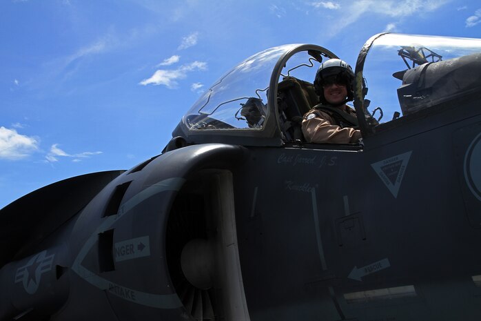 A Marine Aviator in an AV-8B Harrier Jump Jet from Marine Medium Tiltrotor Squadron 365 (Reinforced), 24th Marine Expeditionary Unit, waits to take off from the USS Iwo Jima off the coast of North Carolina, Aug. 11, 2014. The 24th MEU is taking part in Amphibious Squadron/Marine Expeditionary Unit Integration, or PMINT, the 24th MEU’s second major pre-deployment training exercise. PMINT is designed to bring Marines and Sailors from the 24th MEU and Amphibious Squadron 8 together for the first time aboard the ships of the Iwo Jima Amphibious Ready Group. (U.S. Marine Corps photo by Lance Cpl. Dani A. Zunun)