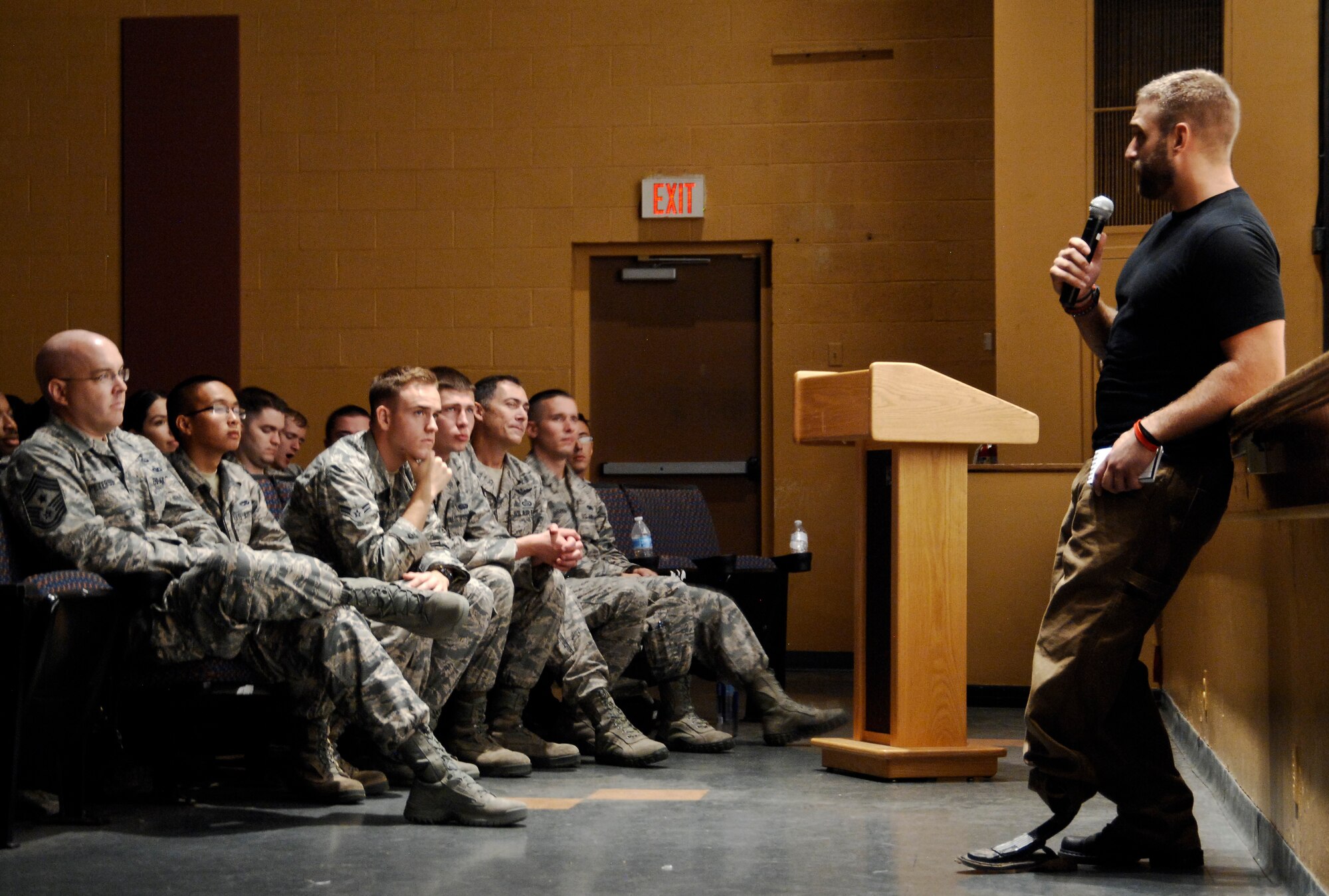 Retired U.S. Army Staff Sgt. Earl Granville, wounded veteran, speaks to 355th Fighter Wing Airmen about personal experiences in overcoming adversity, during a Comprehensive Airmen Fitness day at Davis-Monthan Air Force Base, Ariz., Aug. 11, 2014. CAF day is focused on core values and a culture of dignity and respect, as well as mental, physical, social and spiritual fitness among all Airmen. (U.S. Air Force photo by Staff Sgt. Angela Ruiz/Released)