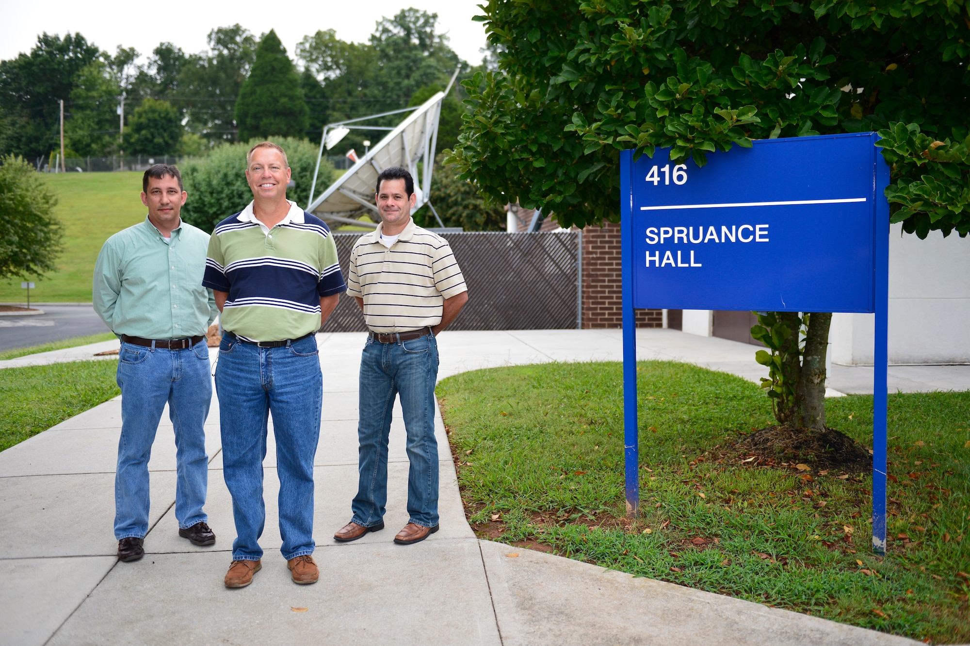 MCGHEE TYSON AIR NATIONAL GUARD BASE, Tenn. -- The Federal Government Distance Learning Association recognized the I.G. Brown Training and Education Center here recently with the 2014 Innovation Award. From left, David Barlow, graphics manager, Gerry Barnes, Warrior Network director and broadcast engineer, Ron Waite, broadcast engineer. (U.S. Air National Guard photo by Master Sgt. Mike R. Smith/Released)  