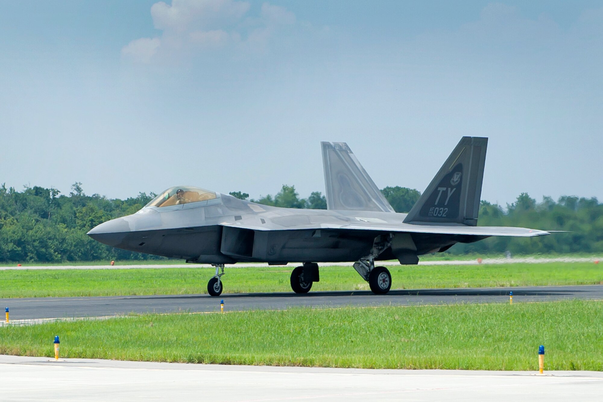 A 43rd Fighter Squadron F-22 Raptor taxies on the flightline at the Naval Air Station-Joint Reserve Base, New Orleans, July 25. More than 230 Team Tyndall members, 14 F-22, eight T-38 Talons and approximately 30,000 pounds of cargo deployed to alongside the NAS JRB New Orleans to complete training for a record-breaking deployment for the 325th Fighter Wing.  (U.S. Air National Guard photo by Master Sgt. Dan Farrell, 159th Fighter Wing Public Affairs Office/Released)