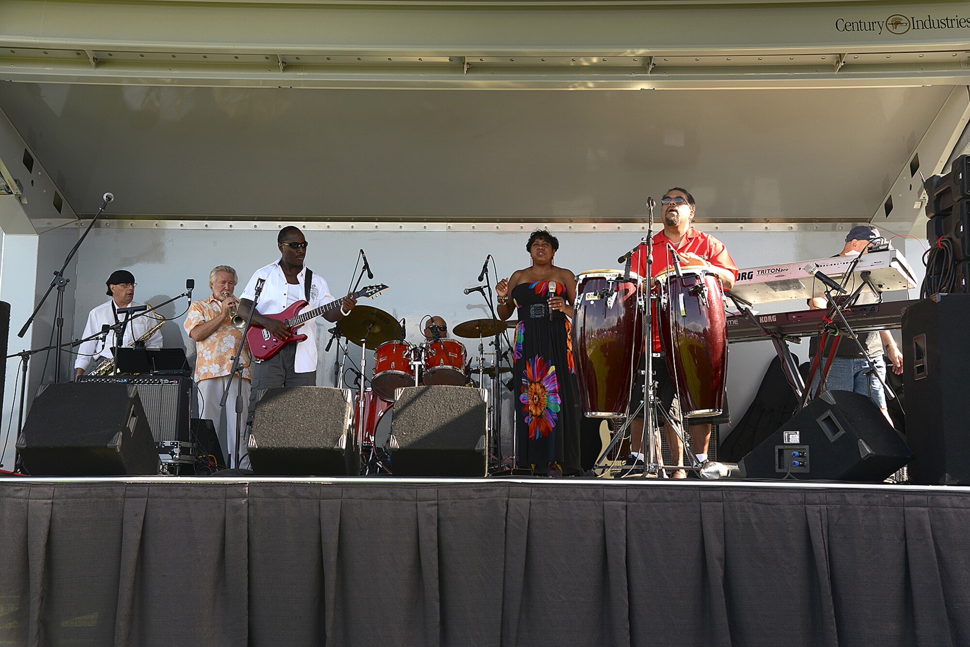 PETERSON AIR FORCE BASE, Colo. — Phat Daddy and the Phat Horn Doctors entertain the crowd at the Family Festival and Concert at Patriot Park Aug. 8. The event was open to all base personnel and their families and included food, beverages, inflatables, old fashioned games and live music. (U.S. Air Force photo/Airman 1st Class Rose Gudex)