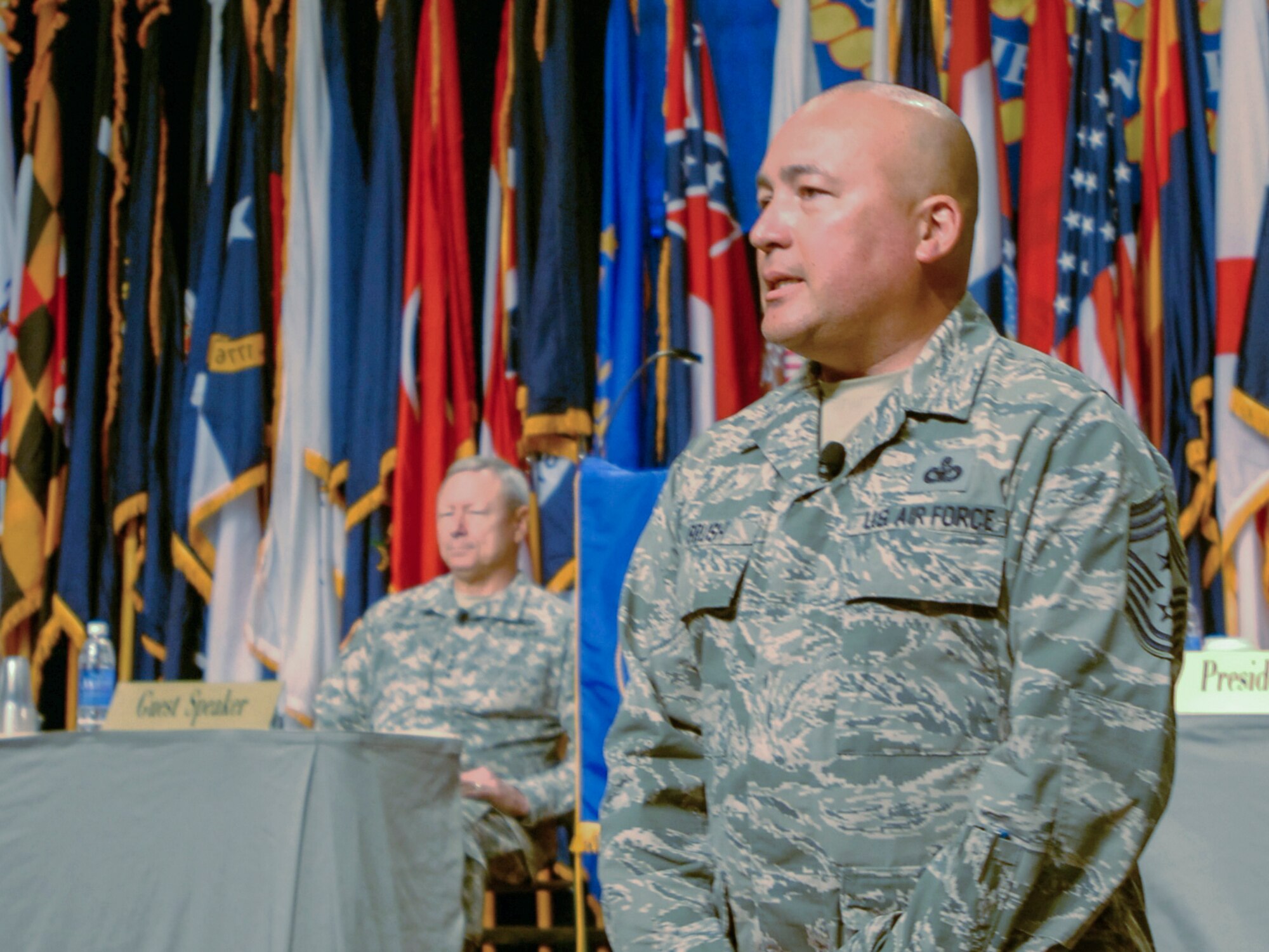 Chief Master Sgt. Mitchell Brush, senior enlisted advisor to the chief of
the National Guard Bureau introduces Gen. Frank Grass to the members and
delegates of the Enlisted Association of the National Guard of the United
States during their 43rd Annual National Conference and Expo, Aug. 11, at
the Phoenix Convention Center. (National Guard photo by Sgt. Lauren Twigg)