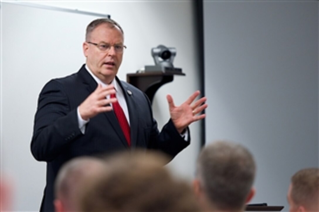 Deputy Defense Secretary Bob Work delivers remarks to newly promoted brigadier generals and rear admirals serving in the U.S. military at the National Defense University on Fort McNair in Washington, D.C., Aug. 12, 2014.  
