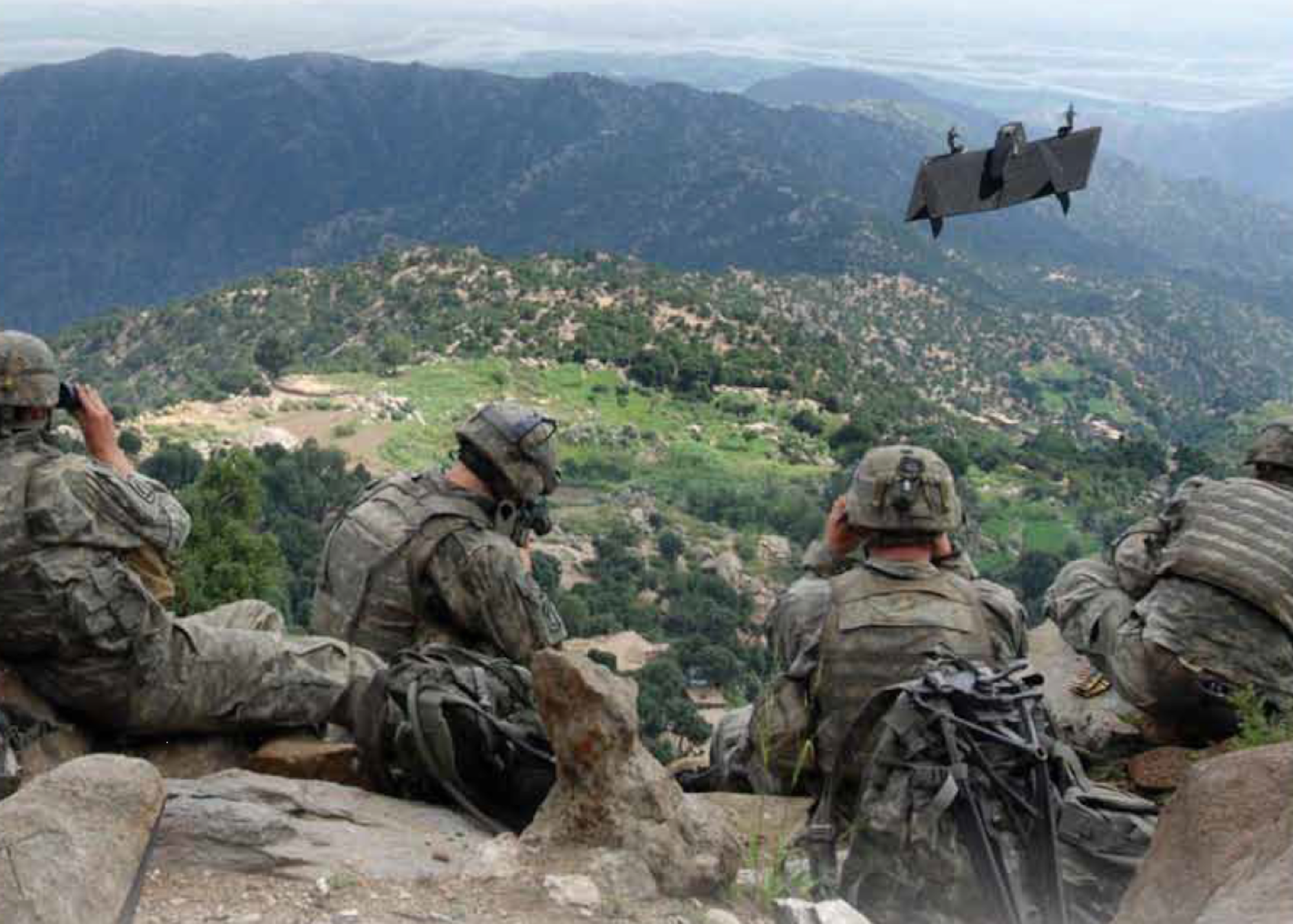 Service members operate a Skate device, a small unmanned aircraft system, in field testing. (Courtesy photo)
