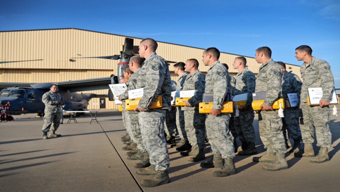 U.S. Air Force Senior Master Sgt. Jesse Meno, 20th Aircraft Maintenance Unit maintenance supervisor, addresses newly appointed dedicated crew chiefs on Aug. 4, 2014 at Cannon Air Force Base, N.M. Meno encouraged the Airmen to own every single process of their new responsibility. (U.S. Air Force Photo/Airman 1st Class Chip Slack)
