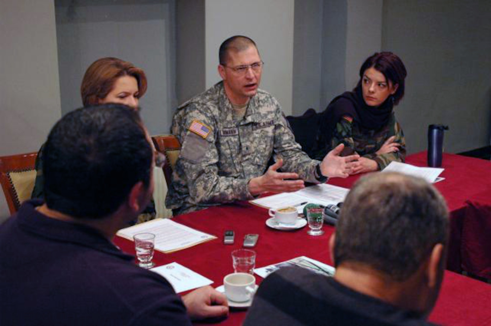 Brig. Gen. Al Dohrmann, a North Dakota National Guardsman and commanding general of Multi-National Task Force-East, answers a question from media in Ferizaj/Urosevac, Kosovo on Dec. 30, 2009.