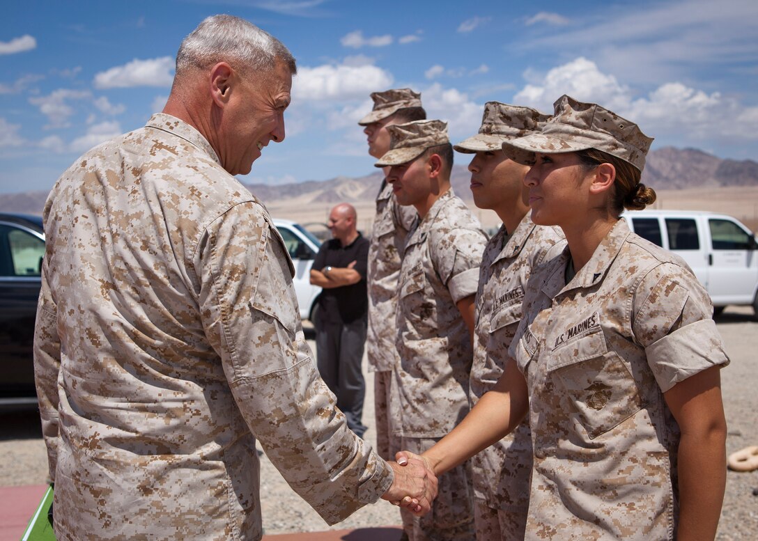 The Assistant Commandant of the Marine Corps, Gen. John M. Paxton, Jr., visits with Marines at Marine Corps Air Ground Combat Center, Twentynine Palms, Ca., Aug. 13, 2014. Gen. Paxton observed Marines participating in the Large Scale Exercise. (U.S. Marine Corps photo by Cpl. Tia Dufour/Released)