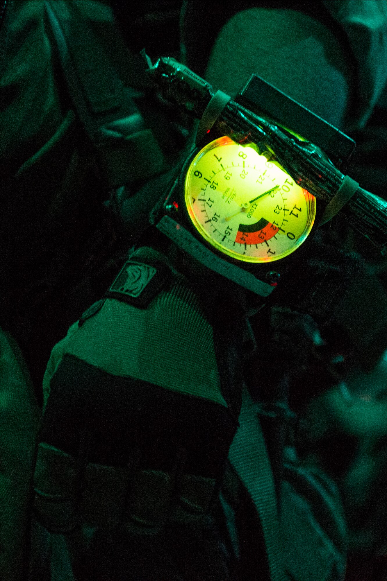 The U.S. Marine Corps 31st Marine Expeditionary Unit prepares to perform high altitude-low opening jumps out of a C-130H Hercules aircraft from the 36th Airlift Squadron, Yokota Air Base, Japan, Aug. 11, 2014. The 36th AS conducts theater airlift, special operations, aeromedical evacuation, search and rescue, repatriation and humanitarian relief missions with a C-130H Hercules mission-ready aircrew while being the only forward-based tactical airlift squadron in the Pacific. (U.S. Air Force photo by Staff Sgt. Stephany Richards/ Released)