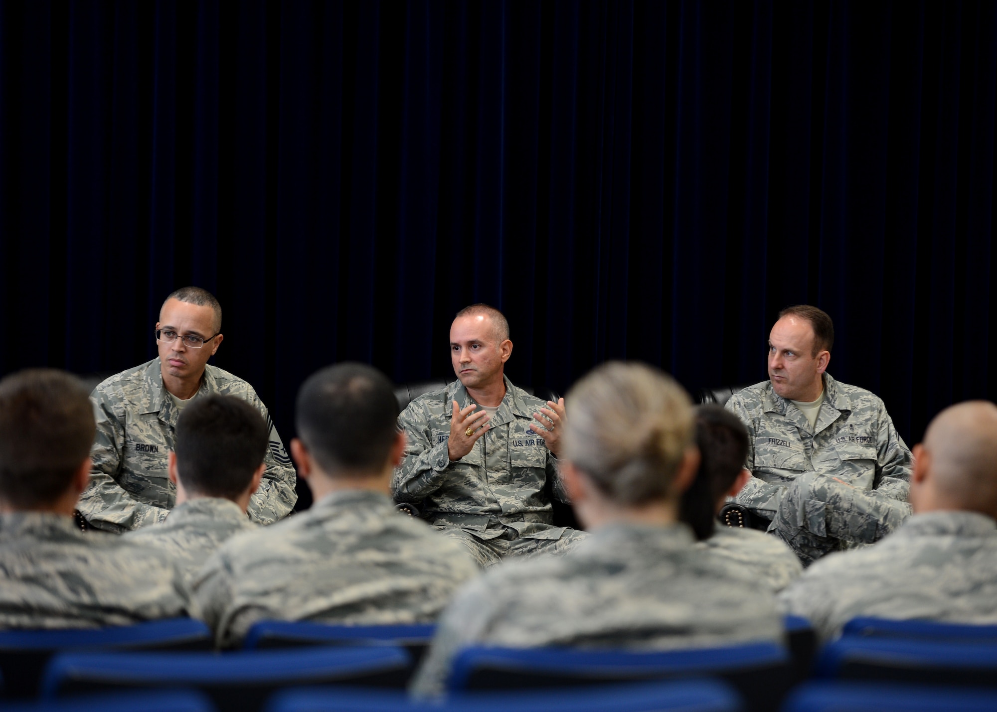 The base U.S. Air Force Chief’s Panel holds a question and answering session during a professional development seminar, Yokota Air Base, Japan, Aug. 12, 2014. The seminar helps build resiliency in Airmen, discuss what is expected from them as professionals and what they can expect from their leaders. (U.S. Air Force photo by Senior Airman Justyn M. Freeman/Released)