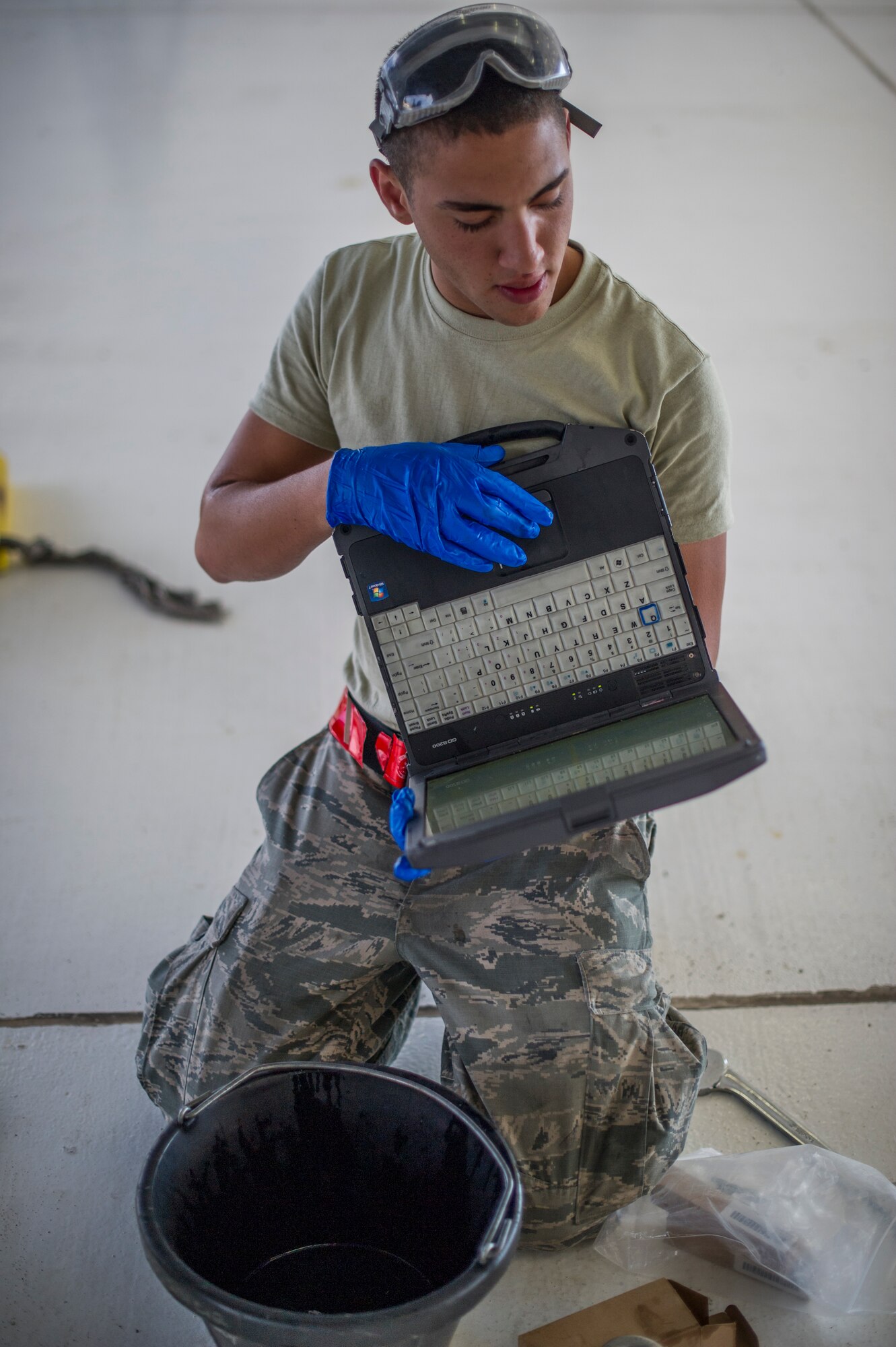 Airman 1st Class Pedro Riveraheavilin, 49th Aircraft Maintenance Squadron MQ-9 Reaper crew chief performs a 400-hour engine inspection at Holloman Air Force Base, N.M., Aug. 12. The 49th AMXS thoroughly inspects each part of the aircraft before takeoff and after landing, looking for any discrepancies that could interfere with the proper operation of the aircraft. Inspections are performed based on various factors including total hours flown and discrepancies noticed or reported during training sorties. Additional inspections are completed on several milestones including 200, 400, 800 and 2,000 hours of flight time. Each inspection is more in-depth as the flight hours increase. (U.S. Air Force photo by Airman 1st Class Leah Ferrante / Released)